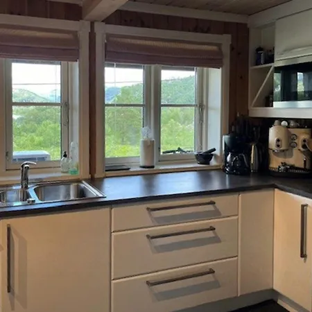 With Views Of River And Mountains