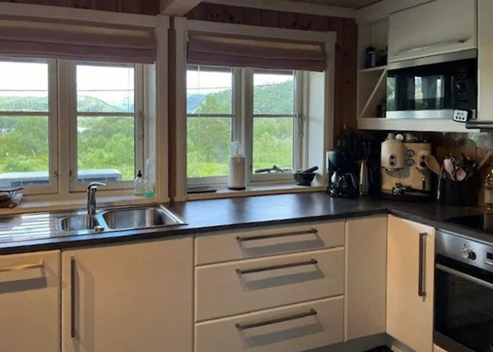 With Views Of River And Mountains